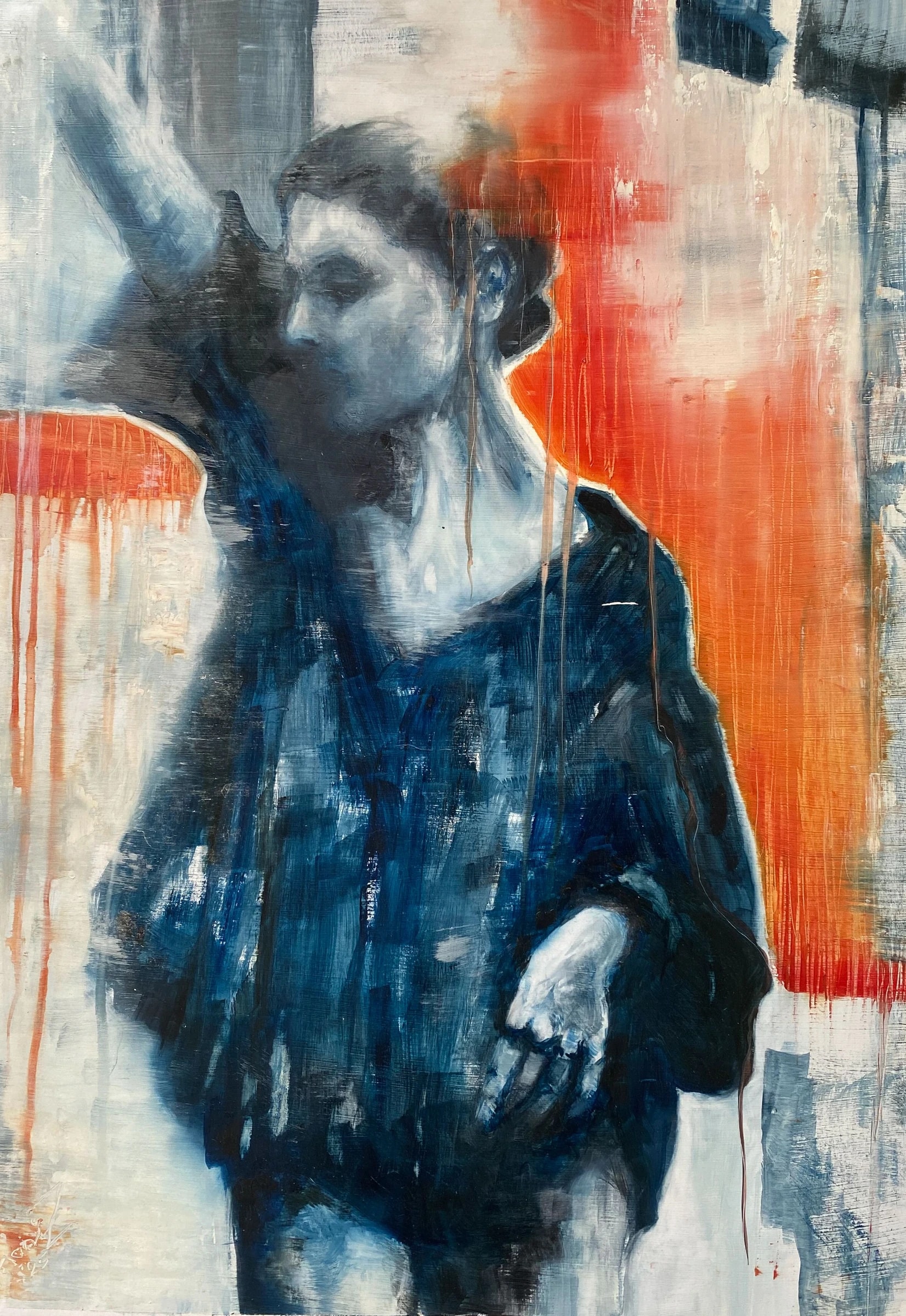 Standing figure in loose blue-black clothing with head turned and one arm raised, before a burning orange field of long drips on scraped white and grey.